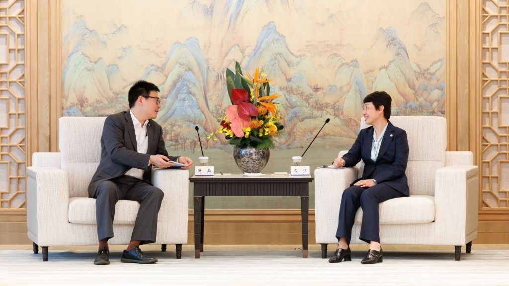 石岱会见上海电气集团董事长吴磊一行